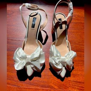 ASOS Bridal Be Mine Vamikaa bow heeled shoes in ivory satin; size 9